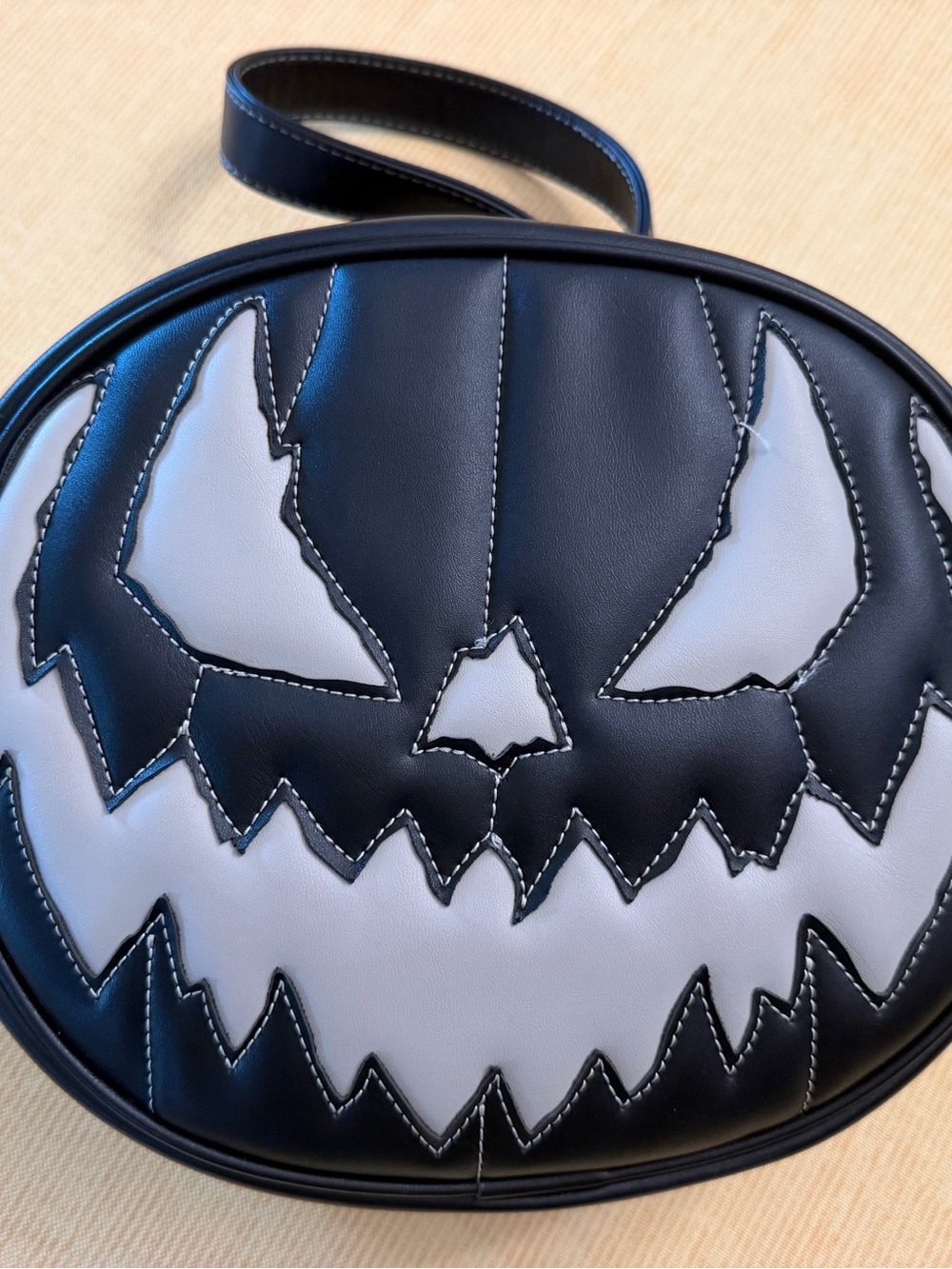 Love Pain and Stitches Pumpkin Kult Jack O Lantern Round Crossbody Halloween Bag